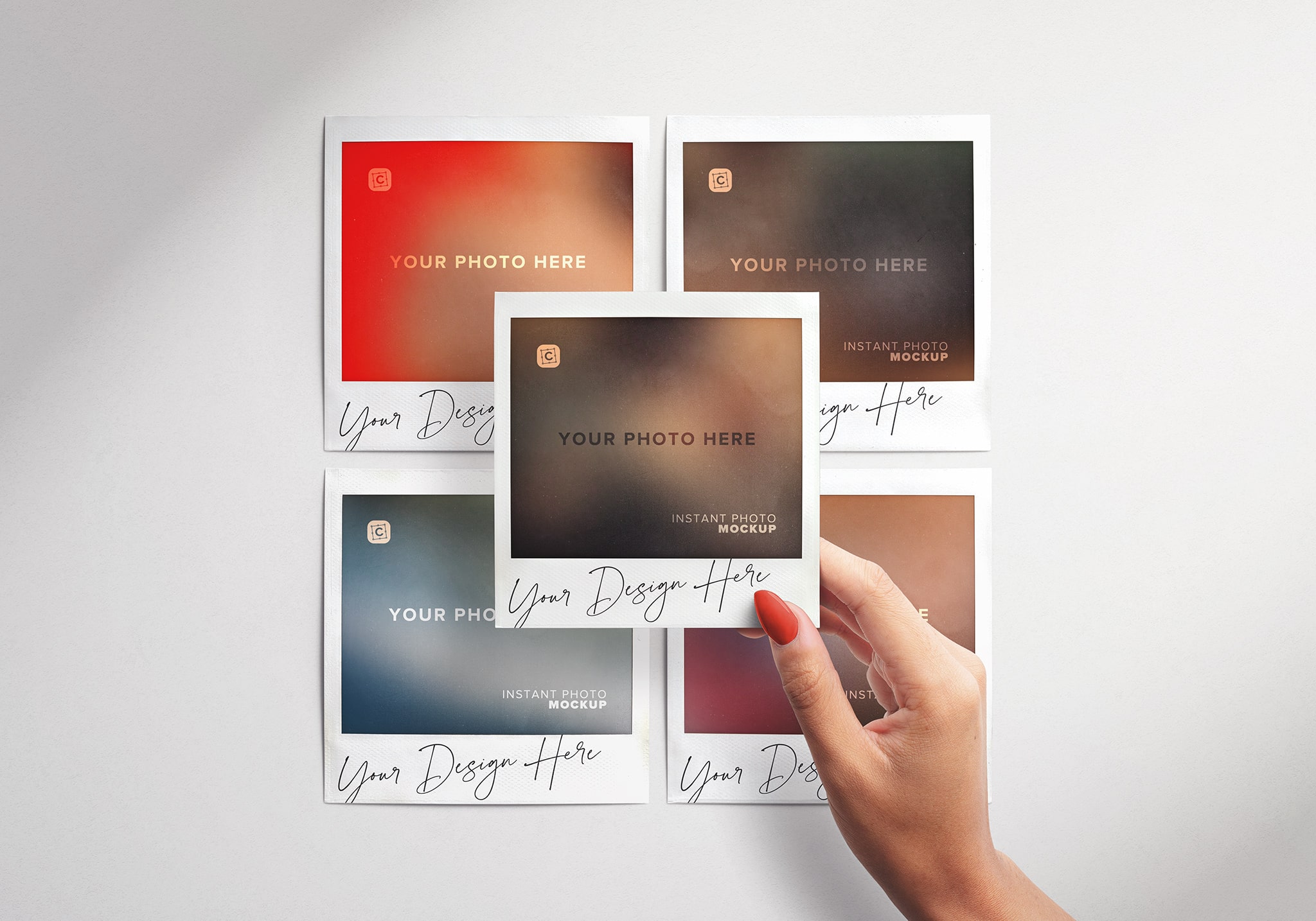 Hand Holding Instant Picture on Top of Grid of Photos 07 PSD Mockup Scene