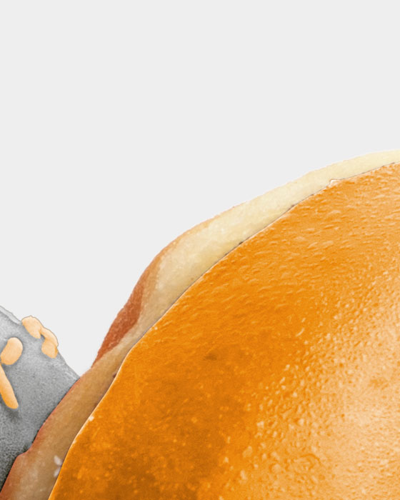Pair of Donuts with Black and Orange Glaze with Sprinkles 02 PNG Image High Resolution.jpg