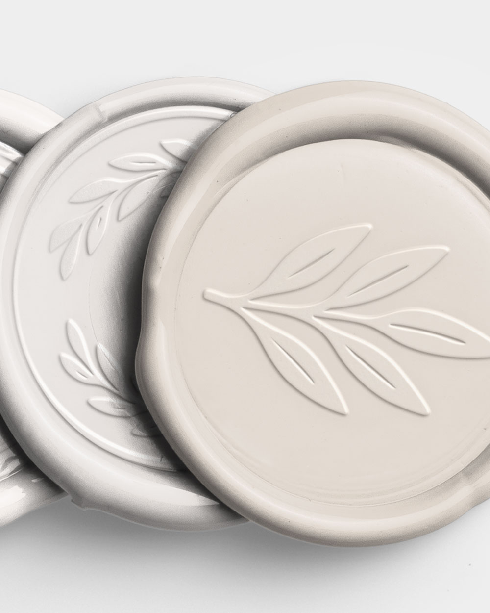 Ivory Vertical Stack of Four Wax Seals with Design 02 PNG Image High Resolution.jpg