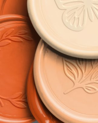 Tangerine Pile of Wax Seals with Design 02 PNG Image High Resolution.jpg