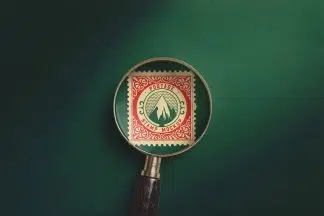 Square Postage Stamp Under Magnifying Glass Mockup 01 Thumbnail2.jpg